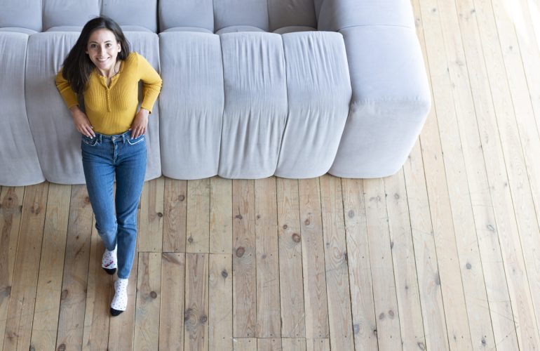 high-angle-woman-living-room