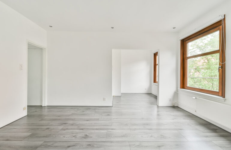 The interior of a white room with windows